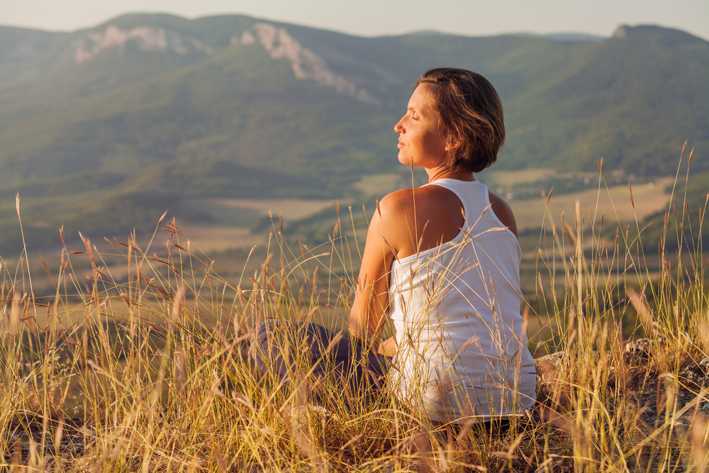 Sitting,In,Meditation,Pose,Woman,Enjoyed,With,Gently,Shining,Sunrise